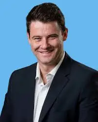 "Andrew Whitfield, South African politician and member of the Democratic Alliance, known for his outspoken views and criticism of ANC policies."