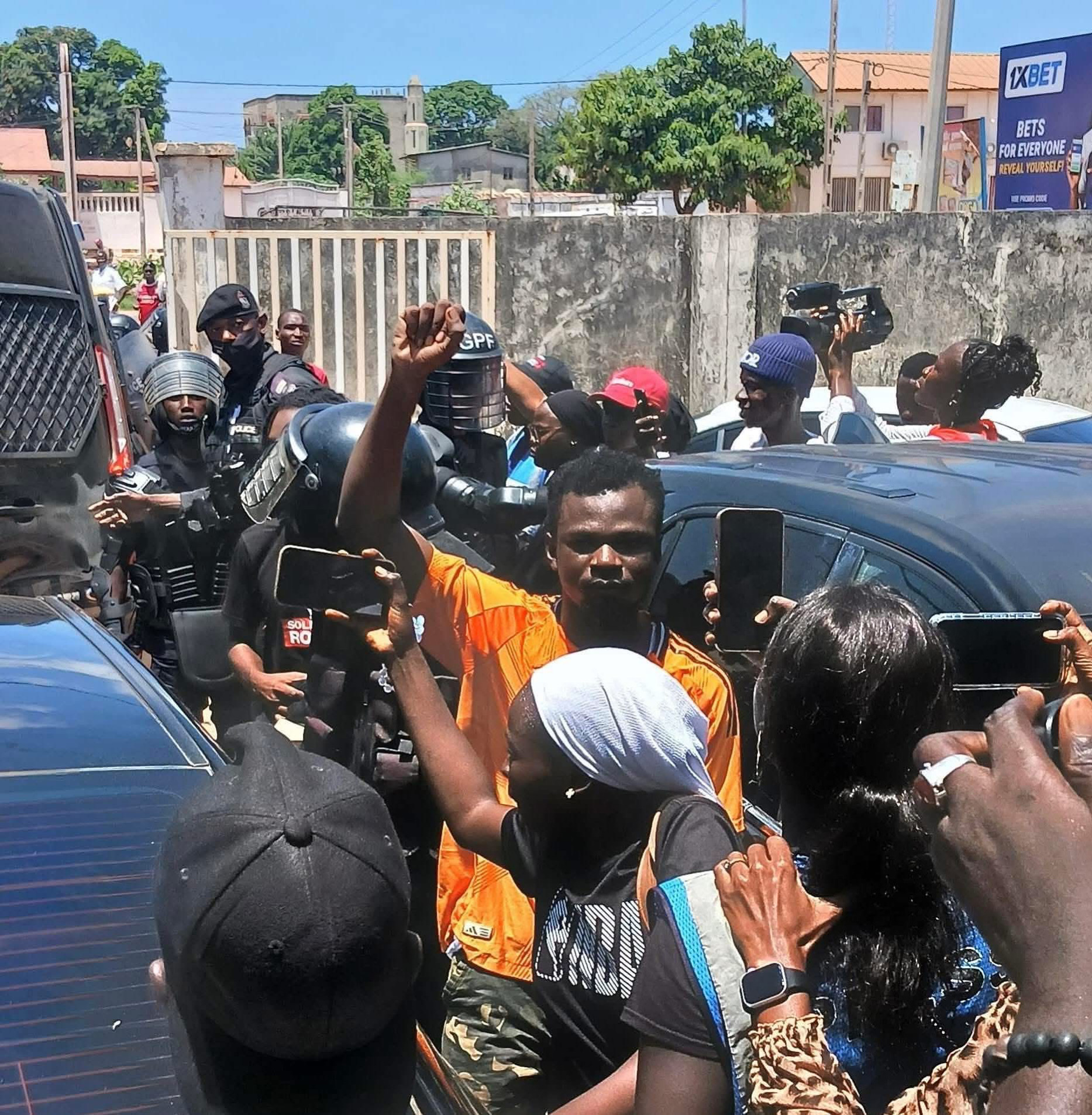 Gambian auditor escorted by police during controversial removal